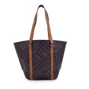 Pre-owned Brunt lerret Louis Vuitton Sac Shopping