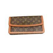 Brun Skinn Louis Vuitton Clutch