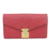 Pre-owned Rødt lerret Louis Vuitton lommebok