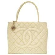 Pre-owned Beige Laer Chanel Medaillon