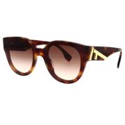 Glamorøse runde solbriller med brun gradientlinse