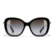 Firkantede solbriller i elegant svart