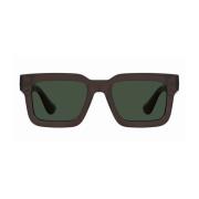Moderne solbriller med rektangulært stel og grønne linser