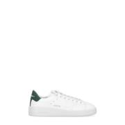Hvite skinn sneakers med grønn stjerne