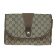 Pre-owned Canvas clutches