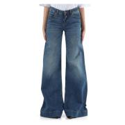 Lav midje utsving jeans med fem lommer