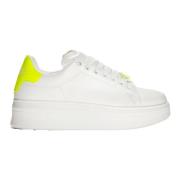 Hvite og gule fluorescerende joggesko
