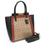 Pre-owned Fabric handbags