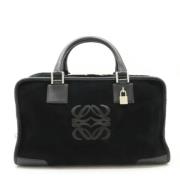 Pre-owned Suede handbags