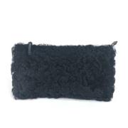 Pre-owned Fabric clutches