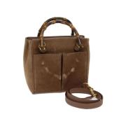 Pre-owned Suede handbags