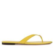 Klassiske gule skinnflip-flops