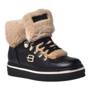 Trainers in black suede and sheepskin