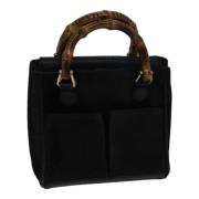 Pre-owned Suede handbags