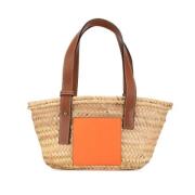 Pre-owned Raffia handbags