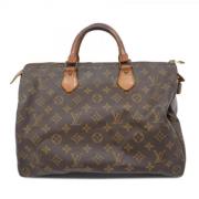 Pre-owned Fabric handbags