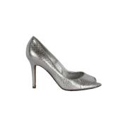 Pre-owned Silver heels