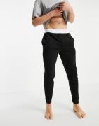 Calvin Klein contrast waistband joggers in black
