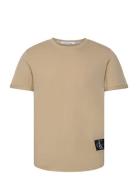 Badge Turn Up Sleeve Tops T-shirts Short-sleeved Beige Calvin Klein Je...